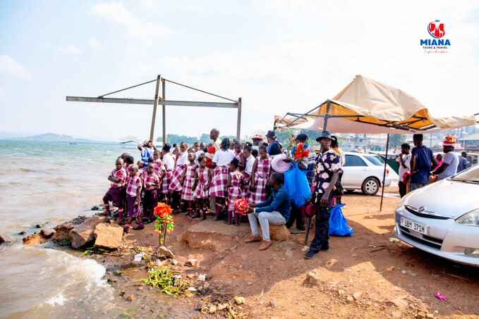 Students on a Miana Tours local school trip in Uganda, exploring cultural heritage sites and national landmarks.