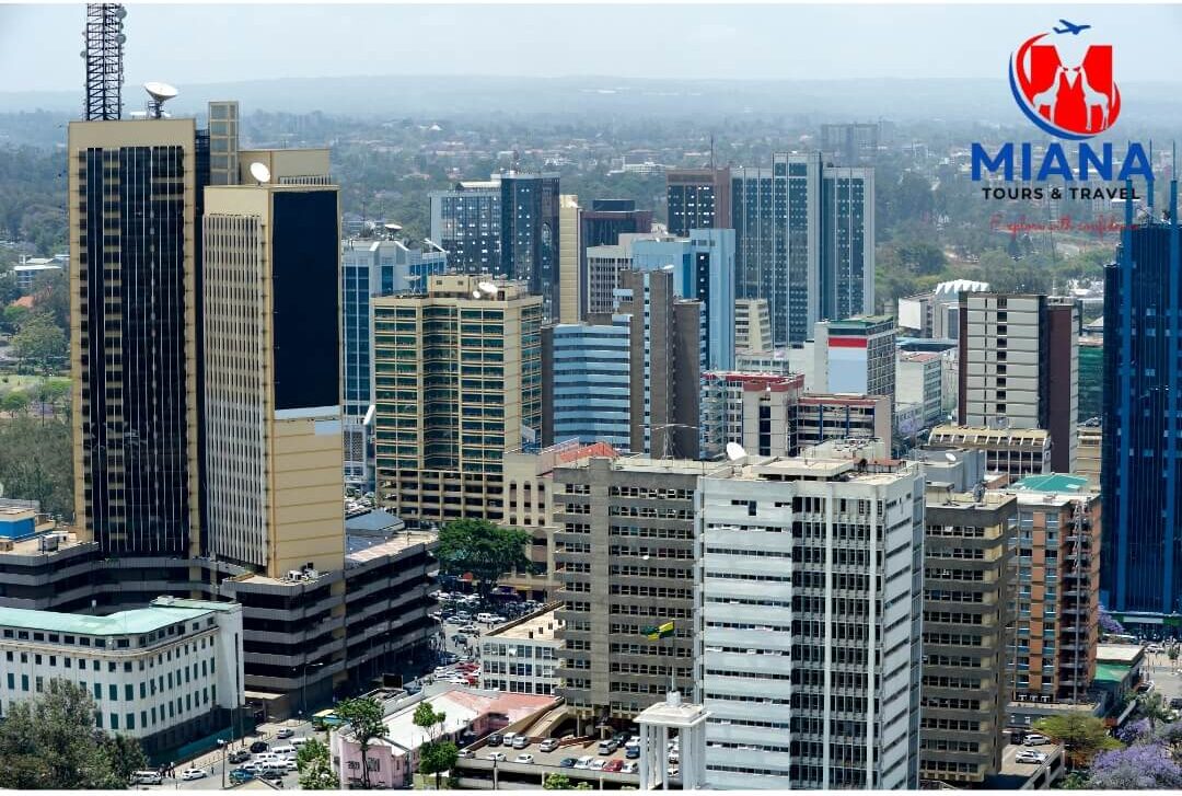 Family on Nairobi safari tour watching giraffes at Giraffe Centre with Nairobi city skyline in background