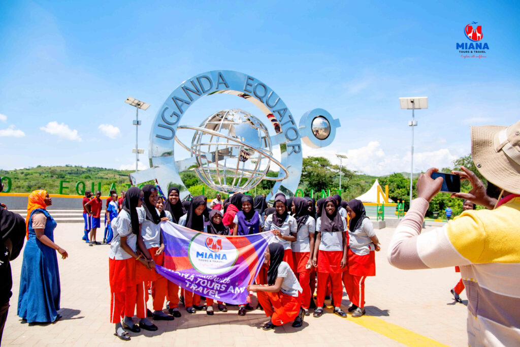 Students on an educational safari in Western Uganda visiting Queen Elizabeth National Park, Kazinga Channel, crater lakes, and hot springs