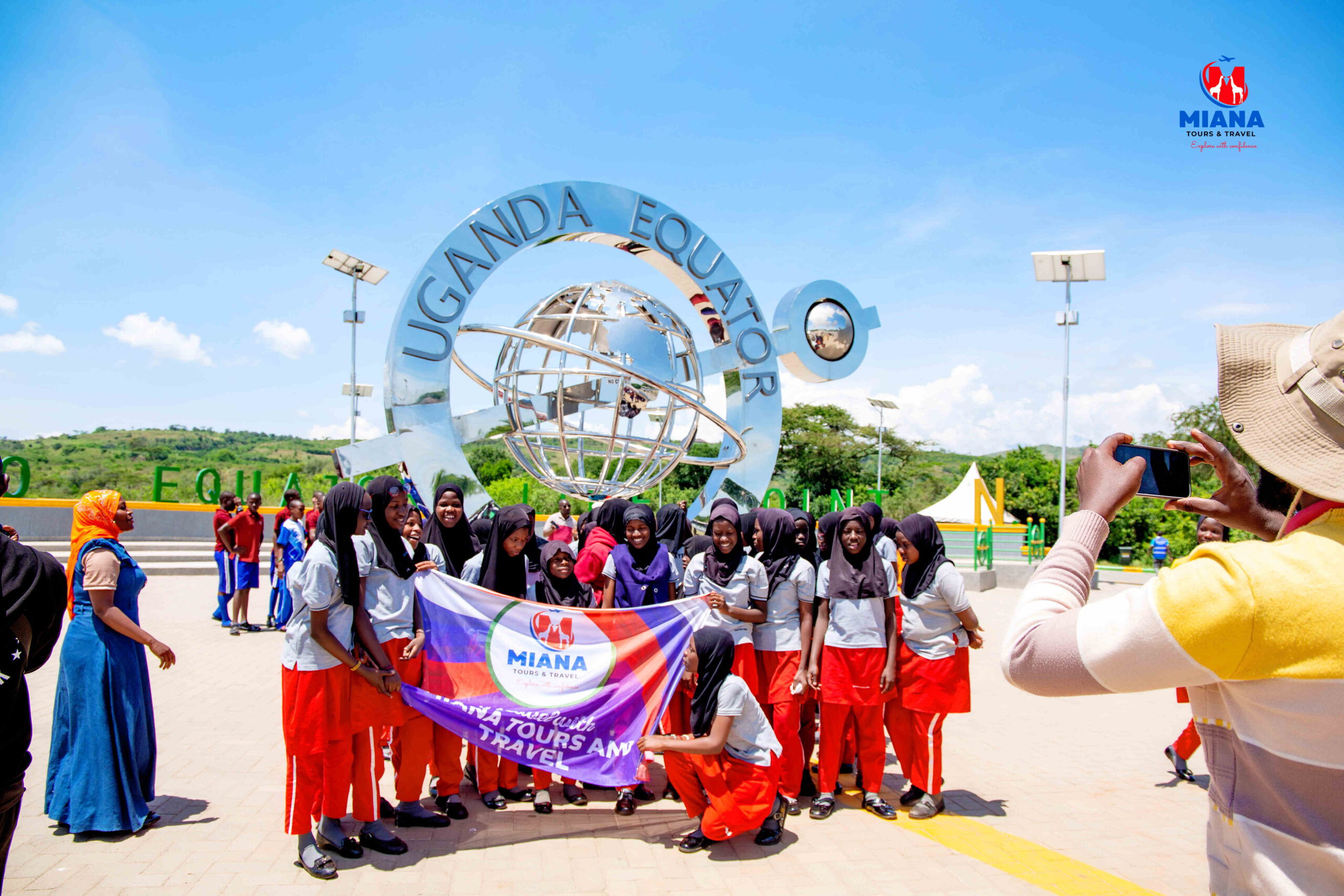 Students on an educational safari in Western Uganda visiting Queen Elizabeth National Park, Kazinga Channel, crater lakes, and hot springs