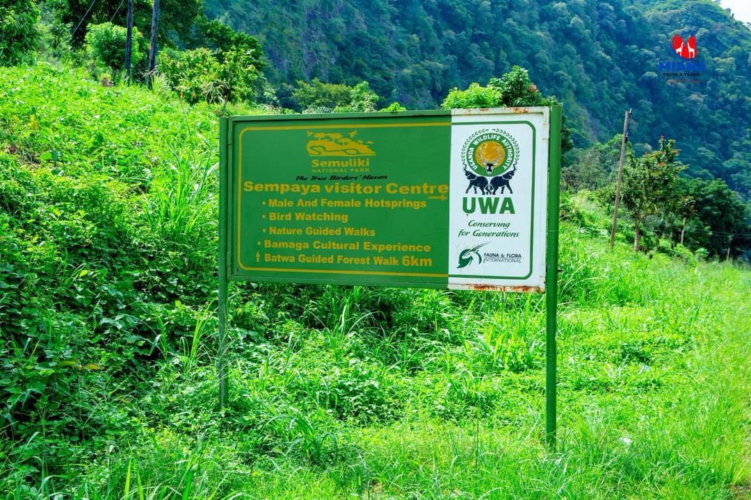 Students exploring Queen Elizabeth National Park, Kazinga Channel Boat Cruise, crater lakes, and cultural heritage sites in Western Uganda.